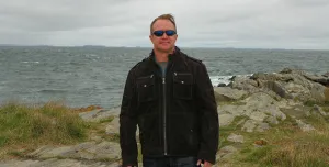 Dr. Christopher Lea by the coast of Coastal Endodontics