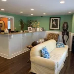 An interior shot of the waiting area and reception of Coastal Endodontics' Hinesville office